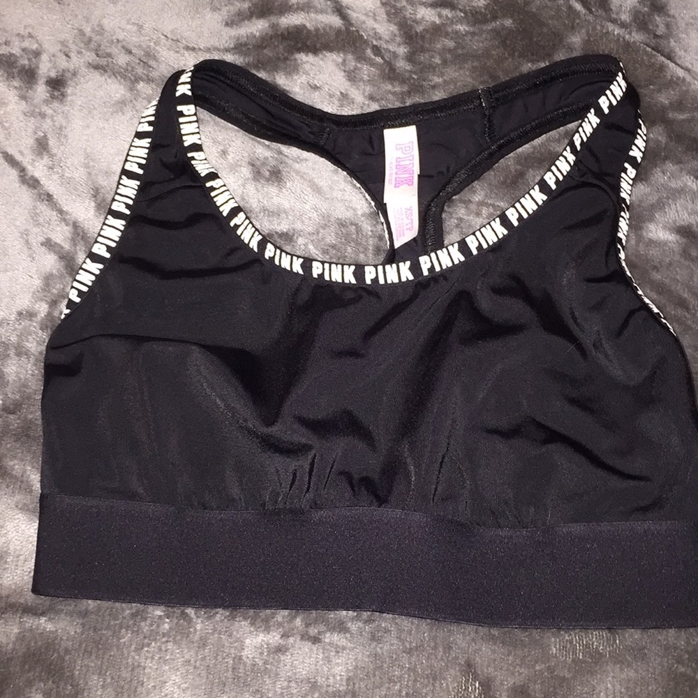 black with white writing. PINK sport bra